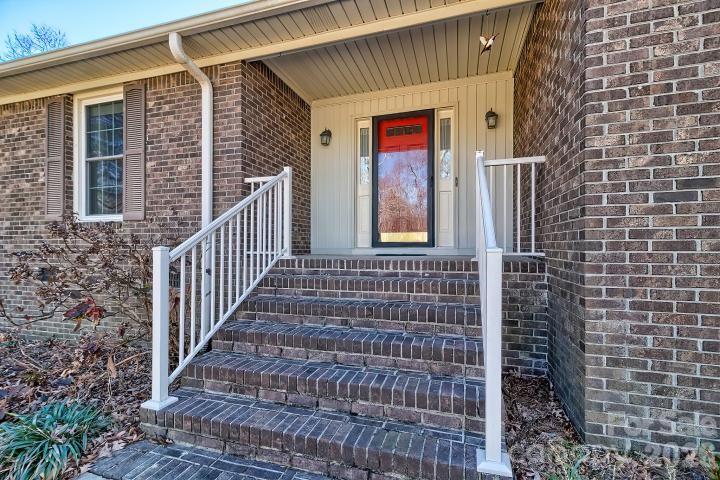 1139 Merribrook Lane Lancaster, SC 29720 - Photo 4 of 37 a view of a brick house with stairs