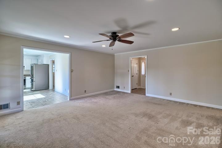 1139 Merribrook Lane Lancaster, SC 29720 - Photo 10 of 37 en view of empty room with a ceiling fan