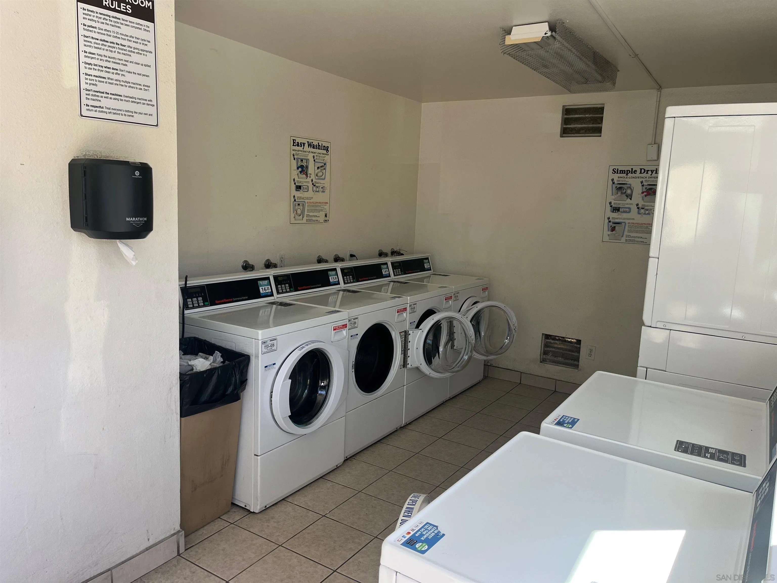 3545 Grove Street, Unit 227 Lemon Grove, CA 91945 - Photo 19 of 27 a utility room with dryer and washer