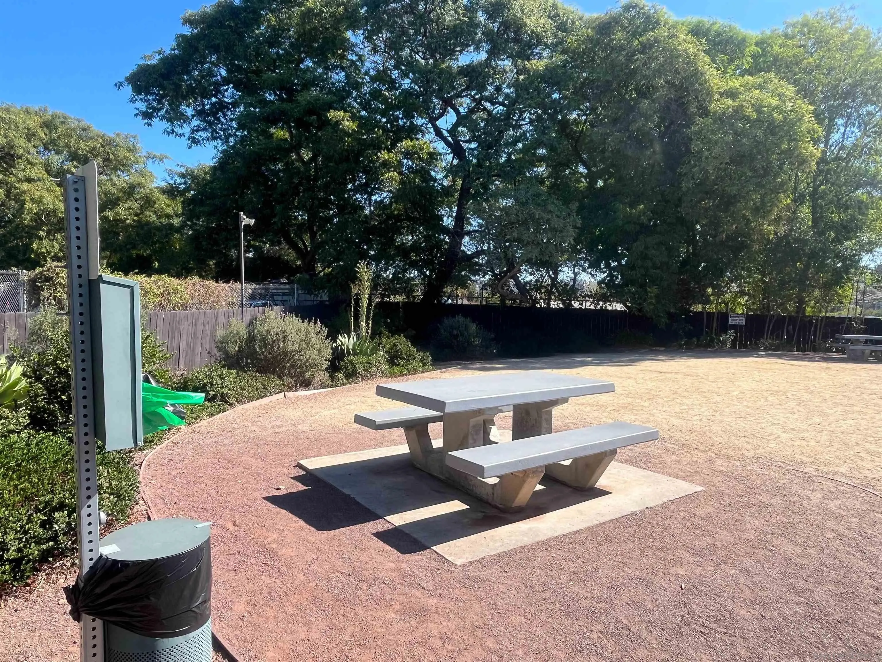 3545 Grove Street, Unit 227 Lemon Grove, CA 91945 - Photo 22 of 27 a view of a backyard with sitting area