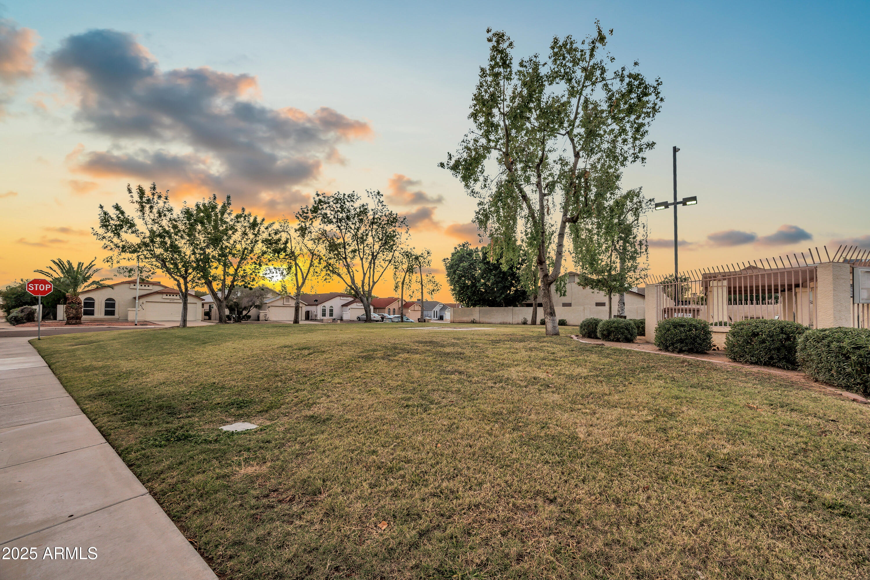 8830 West St John Road Peoria, AZ 85382 - Photo 25 of 25 a view of road with trees