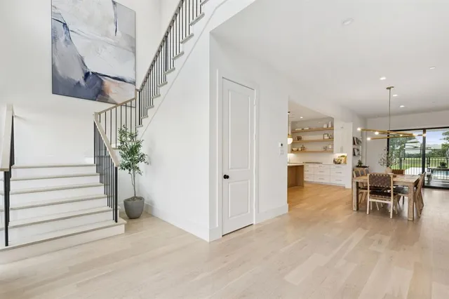 a view of dining room with furniture and entryway