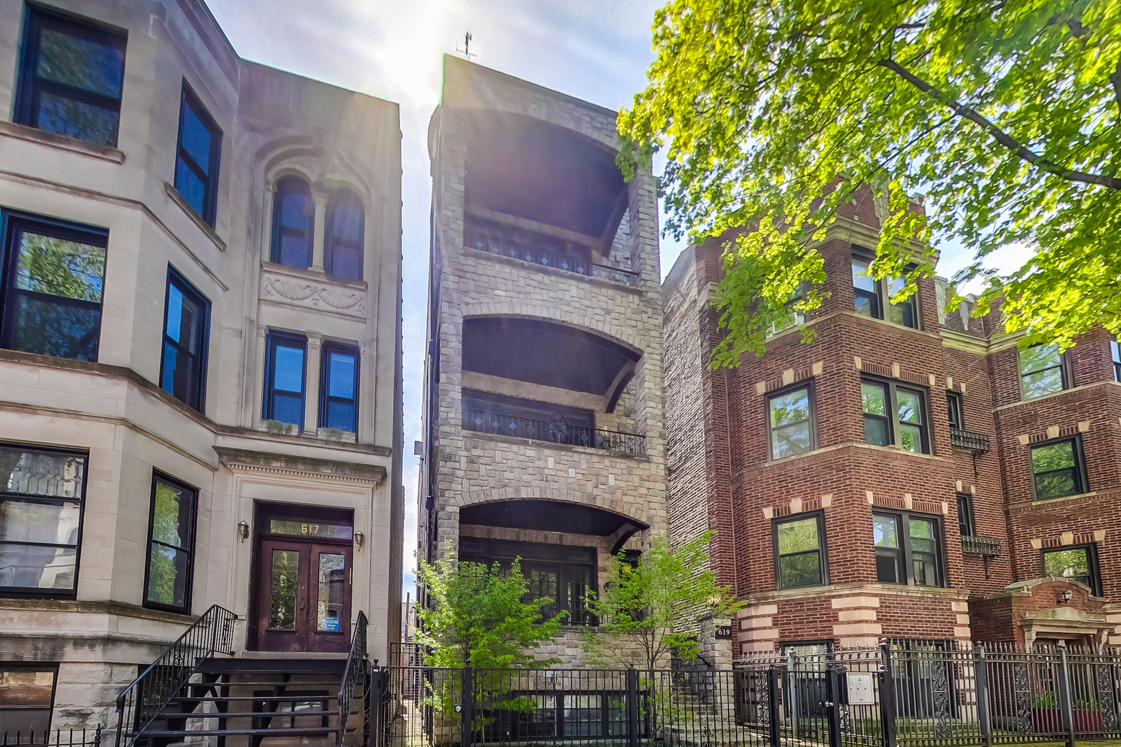 a front view of a multi story residential apartment building