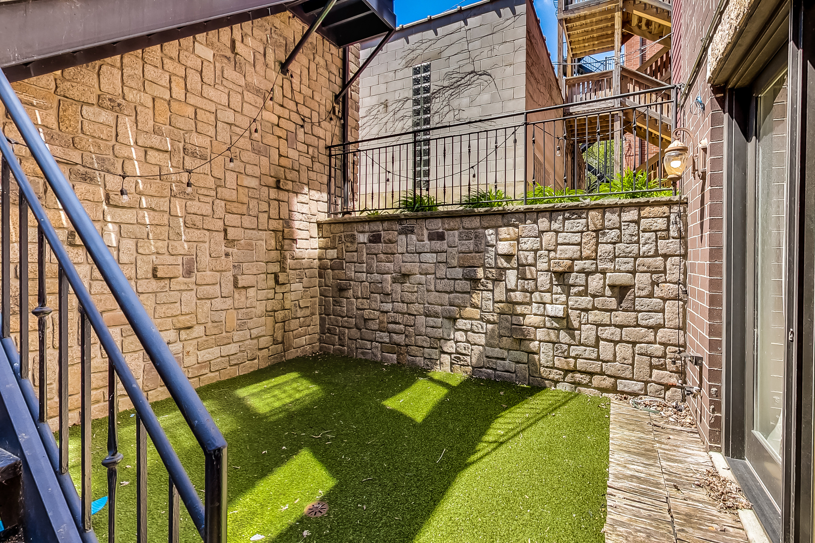 619 West Surf Street, Unit 1 Chicago, IL 60657 - Photo 33 of 36 a view of a balcony with an outdoor space
