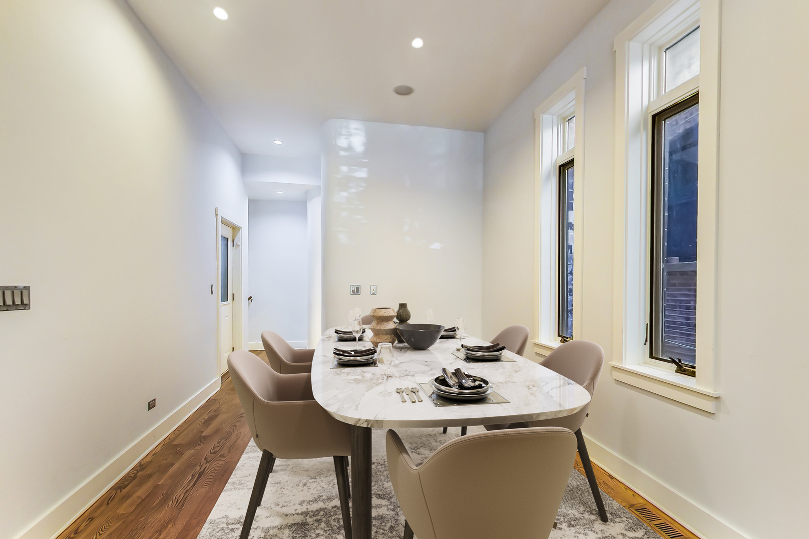 619 West Surf Street, Unit 1 Chicago, IL 60657 - Photo 5 of 36 a view of a dining room with furniture and window