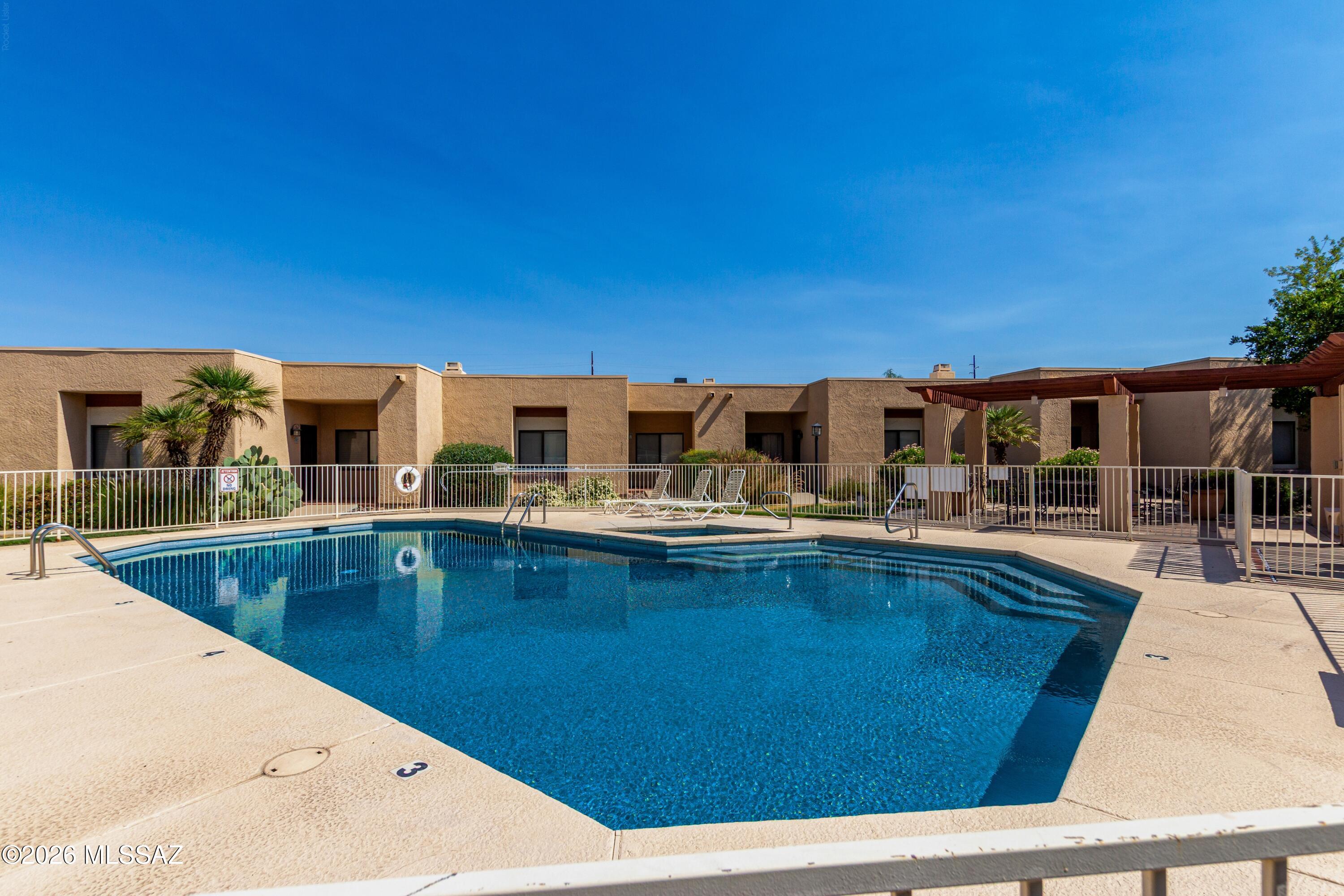3781 East Edison Street Tucson, AZ 85716 - Photo 25 of 28 a view of swimming pool with outdoor seating