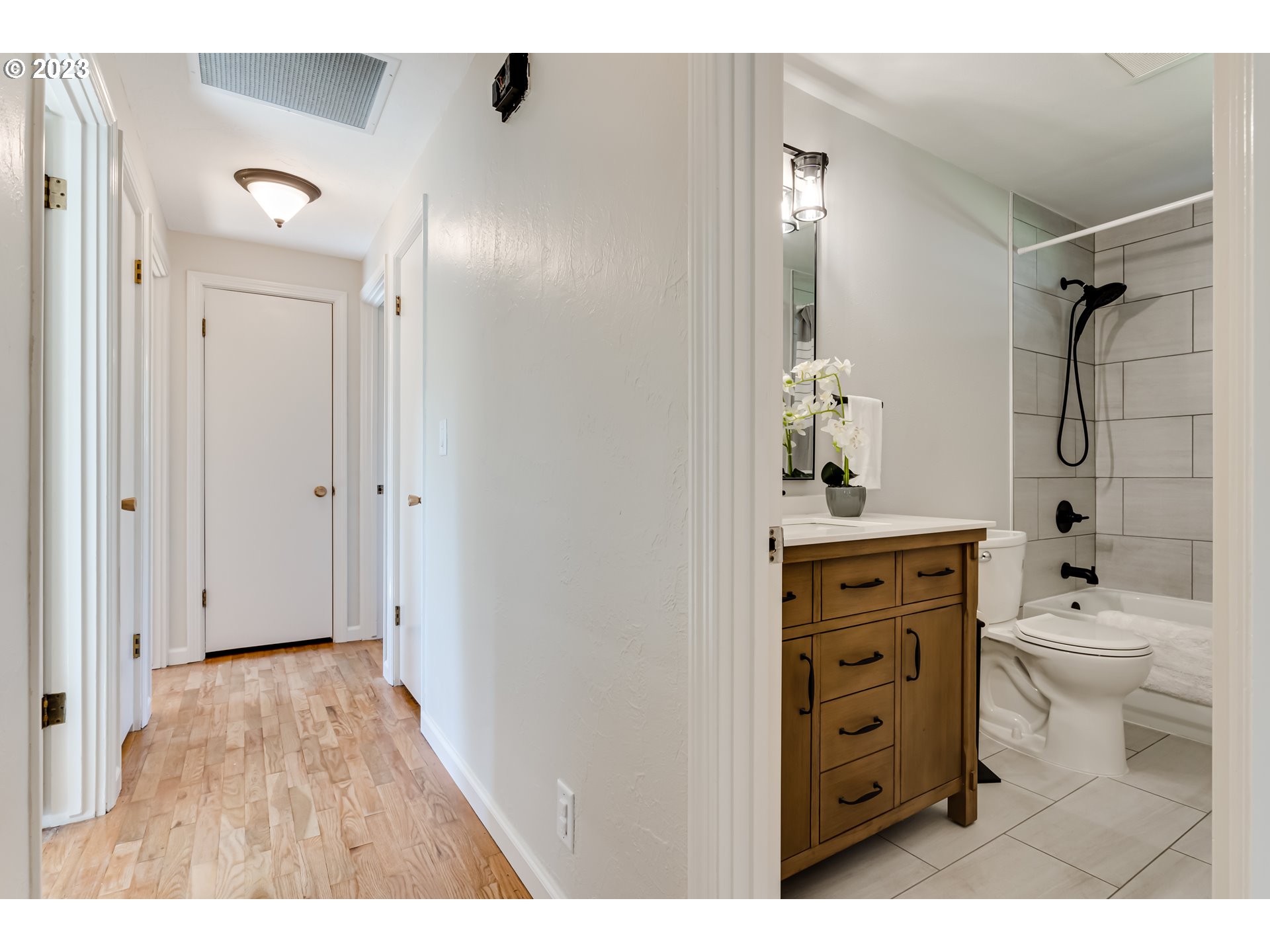 2548 16th Street Springfield, OR 97477 - Photo 14 of 35 a bathroom with a sink a toilet and shower