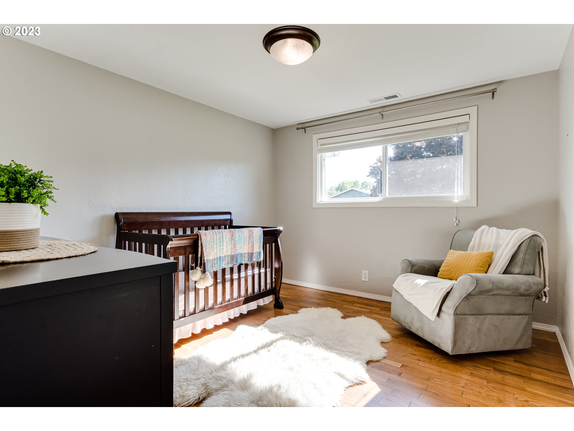 2548 16th Street Springfield, OR 97477 - Photo 16 of 35 a bedroom with furniture and a window