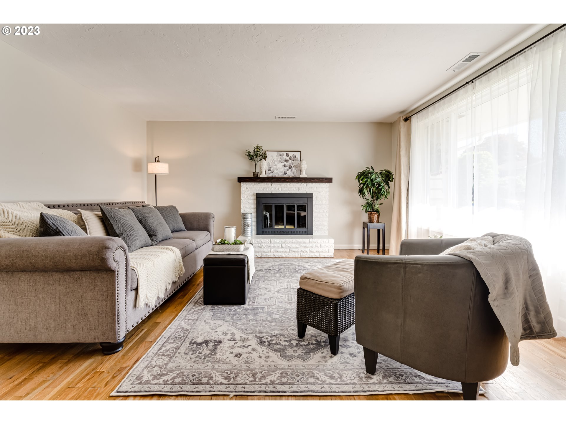 2548 16th Street Springfield, OR 97477 - Photo 5 of 35 a living room with furniture and a fireplace