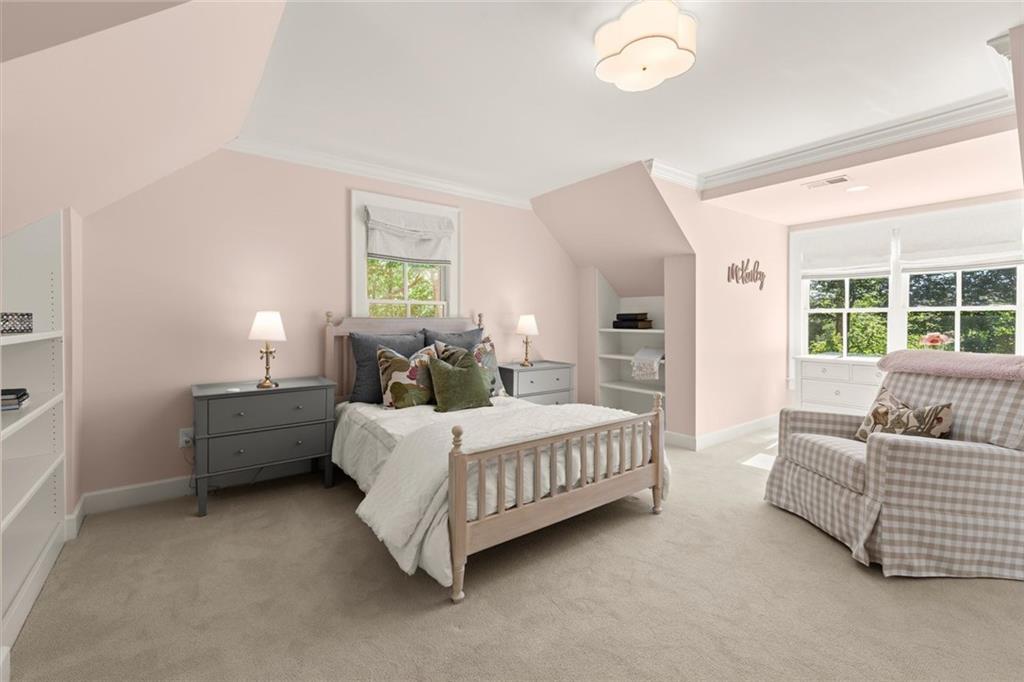 1450 Acworth Due West Road Northwest Kennesaw, GA 30152 - Photo 40 of 77 a room with a bed and a couch