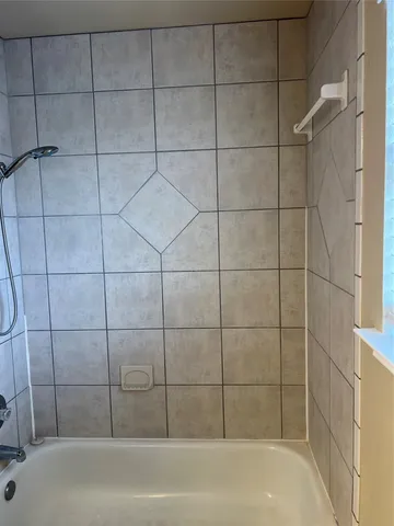 a bathroom with a bathtub