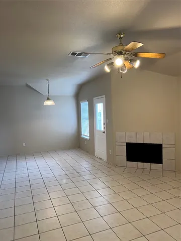 a view of a livingroom with a staircase