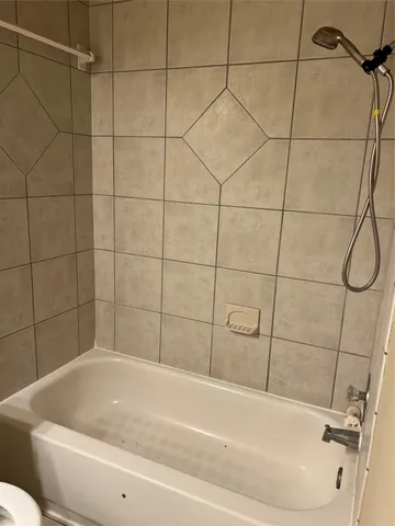 a bathroom with a bathtub