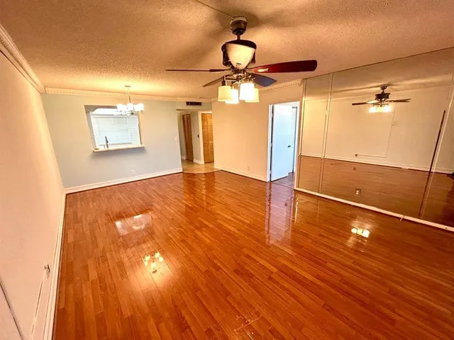 a kitchen with stainless steel appliances a stove a sink and a refrigerator