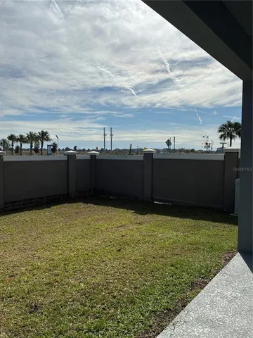 an aerial view of a pool yard swimming pool and outdoor seating