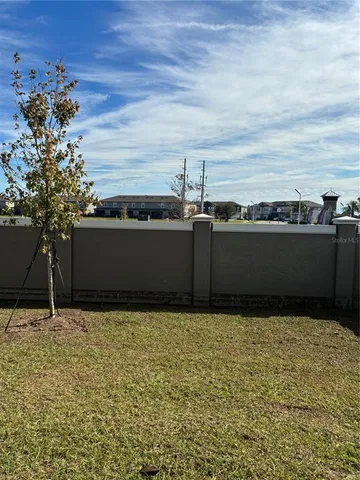 an aerial view of a pool yard swimming pool and outdoor seating