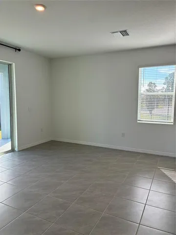 a view of a room that has a window in it