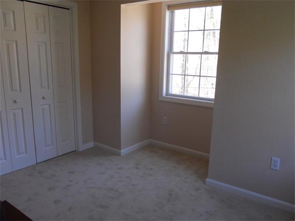 60 Beachview Road Lunenburg, MA 01462 - Photo 14 of 18 an empty room with windows