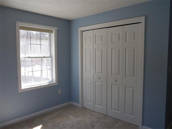 60 Beachview Road Lunenburg, MA 01462 - Photo 15 of 18 an empty room with windows