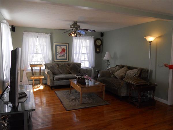 60 Beachview Road Lunenburg, MA 01462 - Photo 3 of 18 a living room with furniture and a flat screen tv