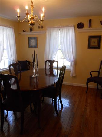 60 Beachview Road Lunenburg, MA 01462 - Photo 5 of 18 a view of a dining room with furniture and window