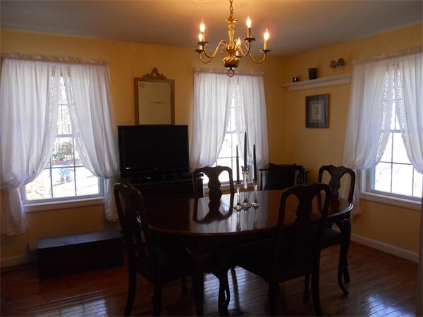 60 Beachview Road Lunenburg, MA 01462 - Photo 6 of 18 a view of a dining room with furniture and window
