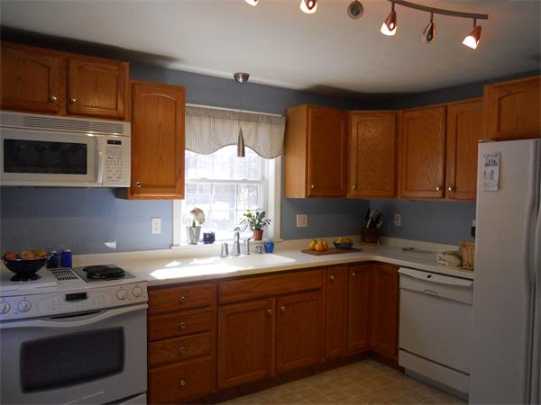 60 Beachview Road Lunenburg, MA 01462 - Photo 8 of 18 a kitchen with a sink a stove and cabinets