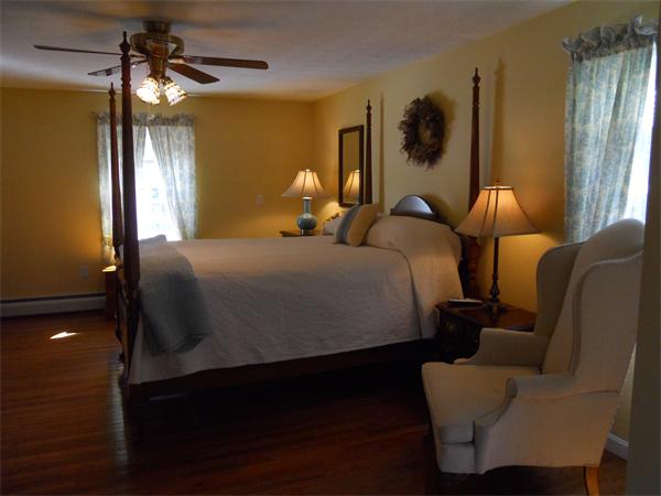 60 Beachview Road Lunenburg, MA 01462 - Photo 10 of 18 a bedroom with bed and window with lamp