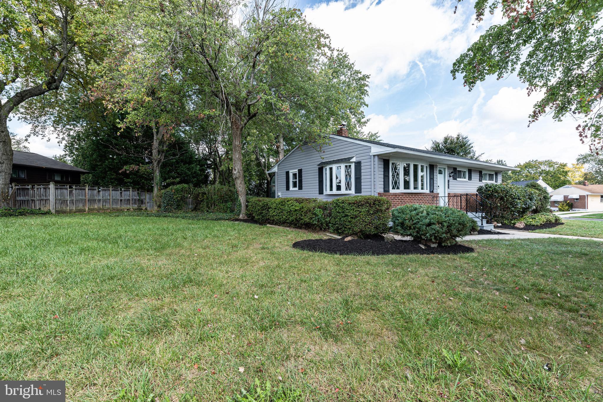 7410 Remoor Road Baltimore, MD 21207 - Photo 3 of 33 a view of a house with a yard and sitting area