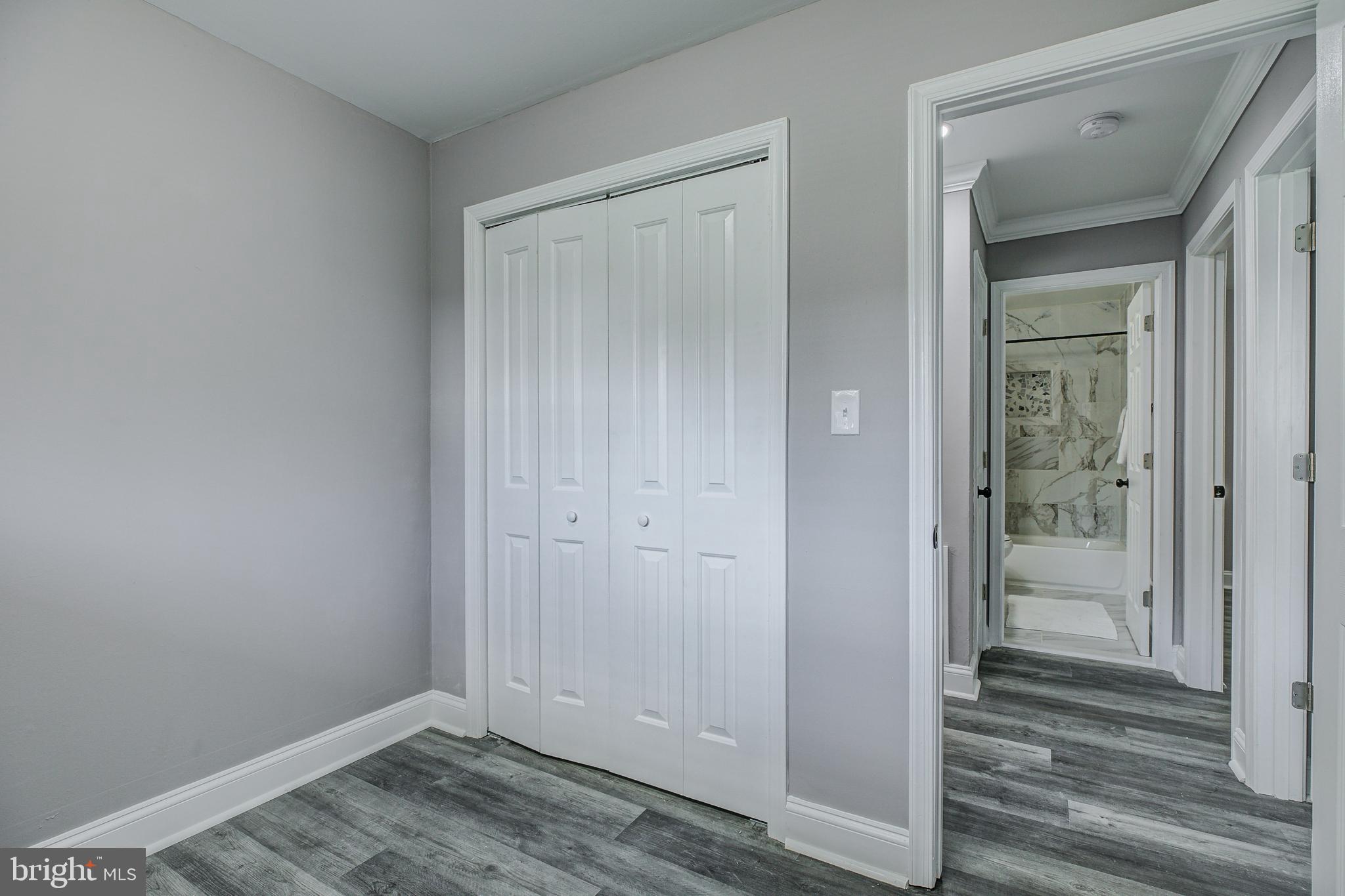 7410 Remoor Road Baltimore, MD 21207 - Photo 22 of 33 wooden floor & closet in a room