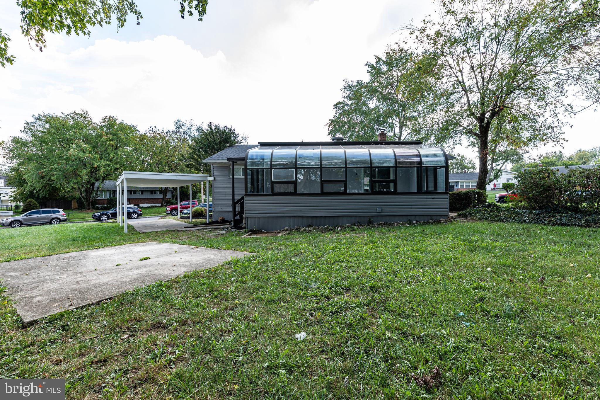 7410 Remoor Road Baltimore, MD 21207 - Photo 33 of 33 a view of a house with a backyard