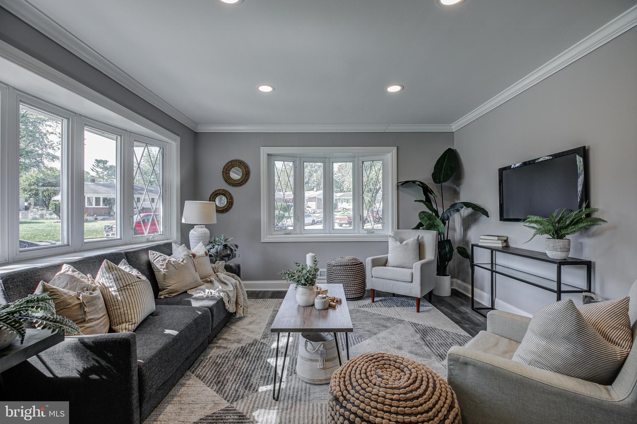 7410 Remoor Road Baltimore, MD 21207 - Photo 6 of 33 a living room with furniture and a large window