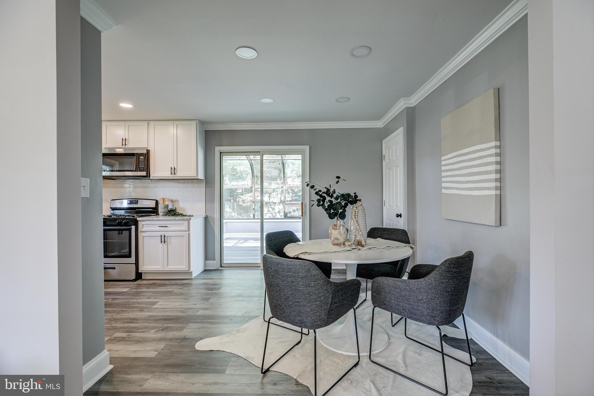 7410 Remoor Road Baltimore, MD 21207 - Photo 9 of 33 a dining room with furniture and window