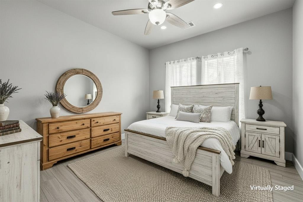 13032 Rudy's Way Streetman, TX 75859 - Photo 25 of 40 Virtually staged guest bedroom with farmhouse furniture and soft neutral finishes.