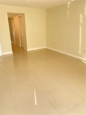 a view of a storage and utility room with closet