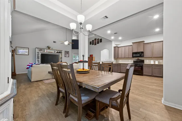 a view of a dining room with furniture