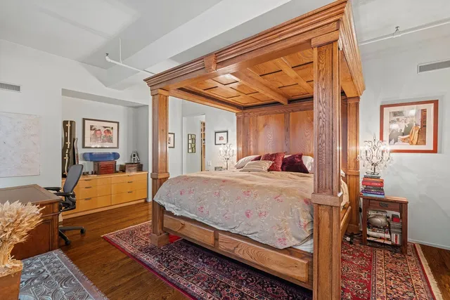 a bathroom with a double vanity sink a mirror and shower