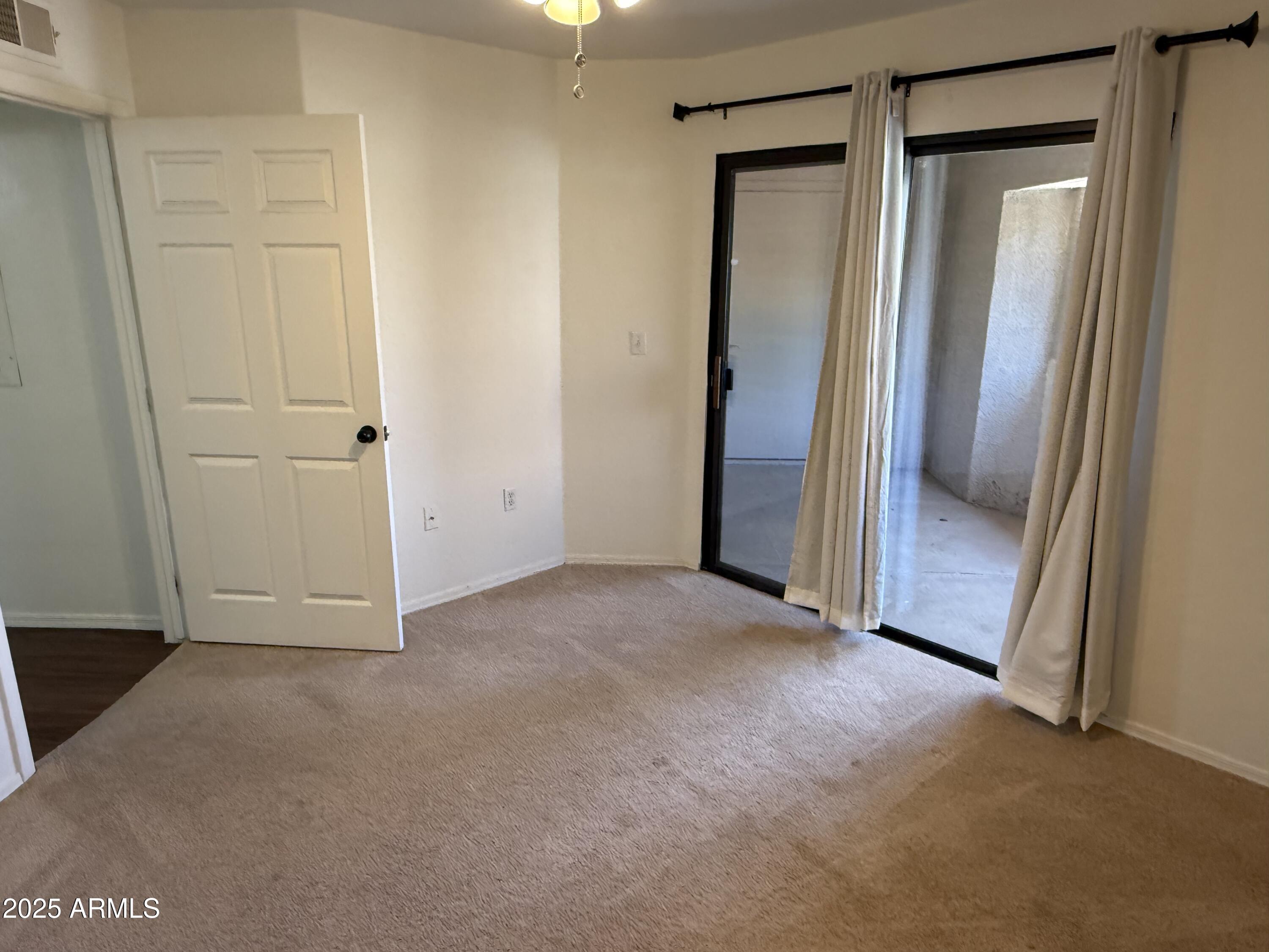 1287 North Alma School Road, Unit 260 Chandler, AZ 85224 - Photo 14 of 20 an empty room with closet