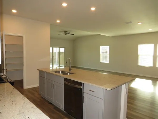 a bathroom with a sink a vanity and a mirror