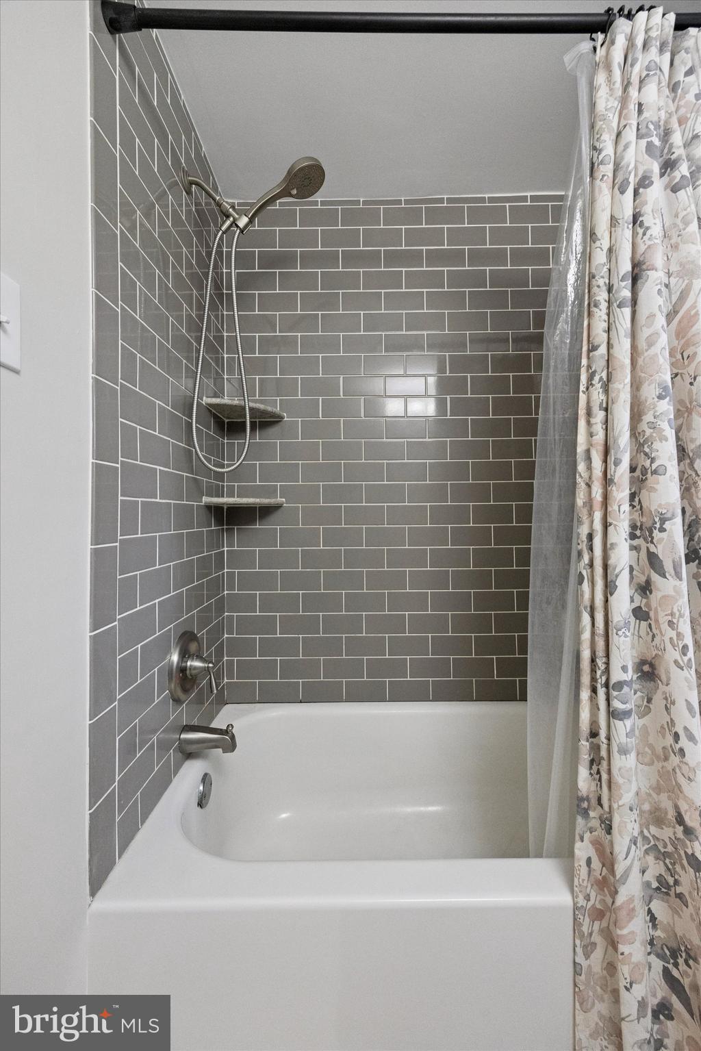 732 Rhoads Drive Springfield, PA 19064 - Photo 12 of 24 a bathroom with a shower and a bathtub