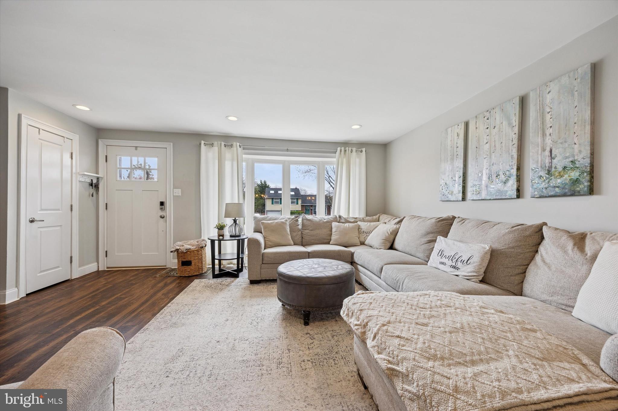 732 Rhoads Drive Springfield, PA 19064 - Photo 4 of 24 a living room with furniture and a large window