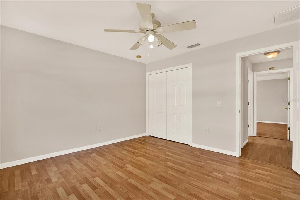 8240 Neda Street Spring Hill, FL 34606 - Photo 34 of 53 wooden floor in an empty room
