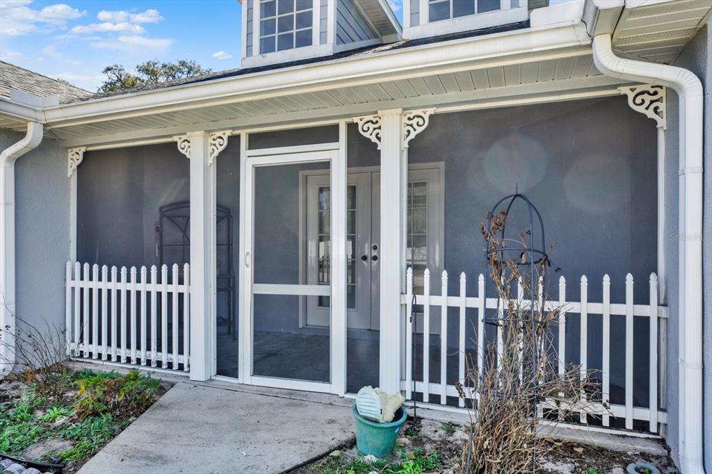 8240 Neda Street Spring Hill, FL 34606 - Photo 53 of 53 a front view of a house with a porch