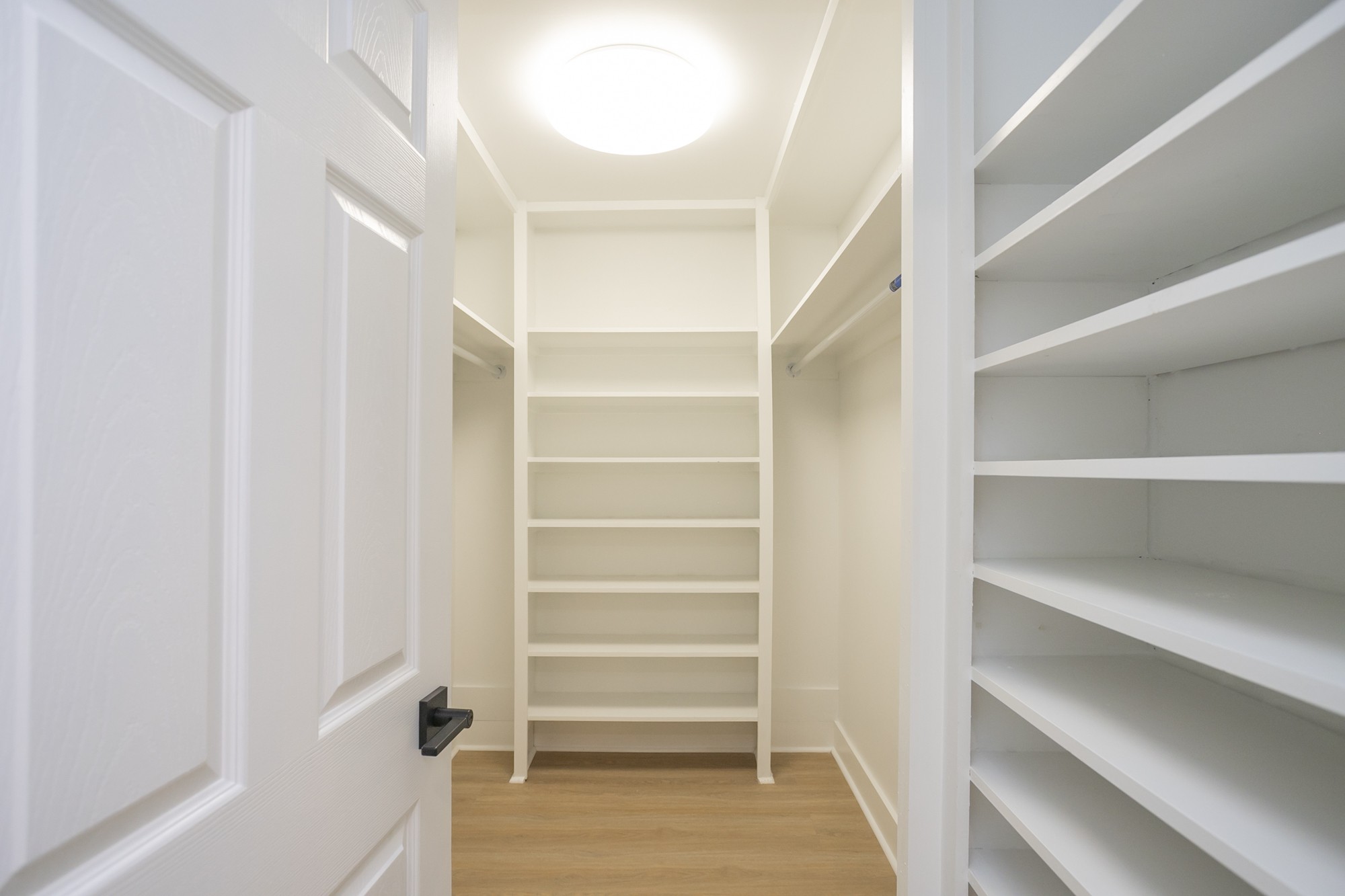5860 Cane Ridge Road Antioch, TN 37013 - Photo 25 of 46 a view of walk in closet with empty racks
