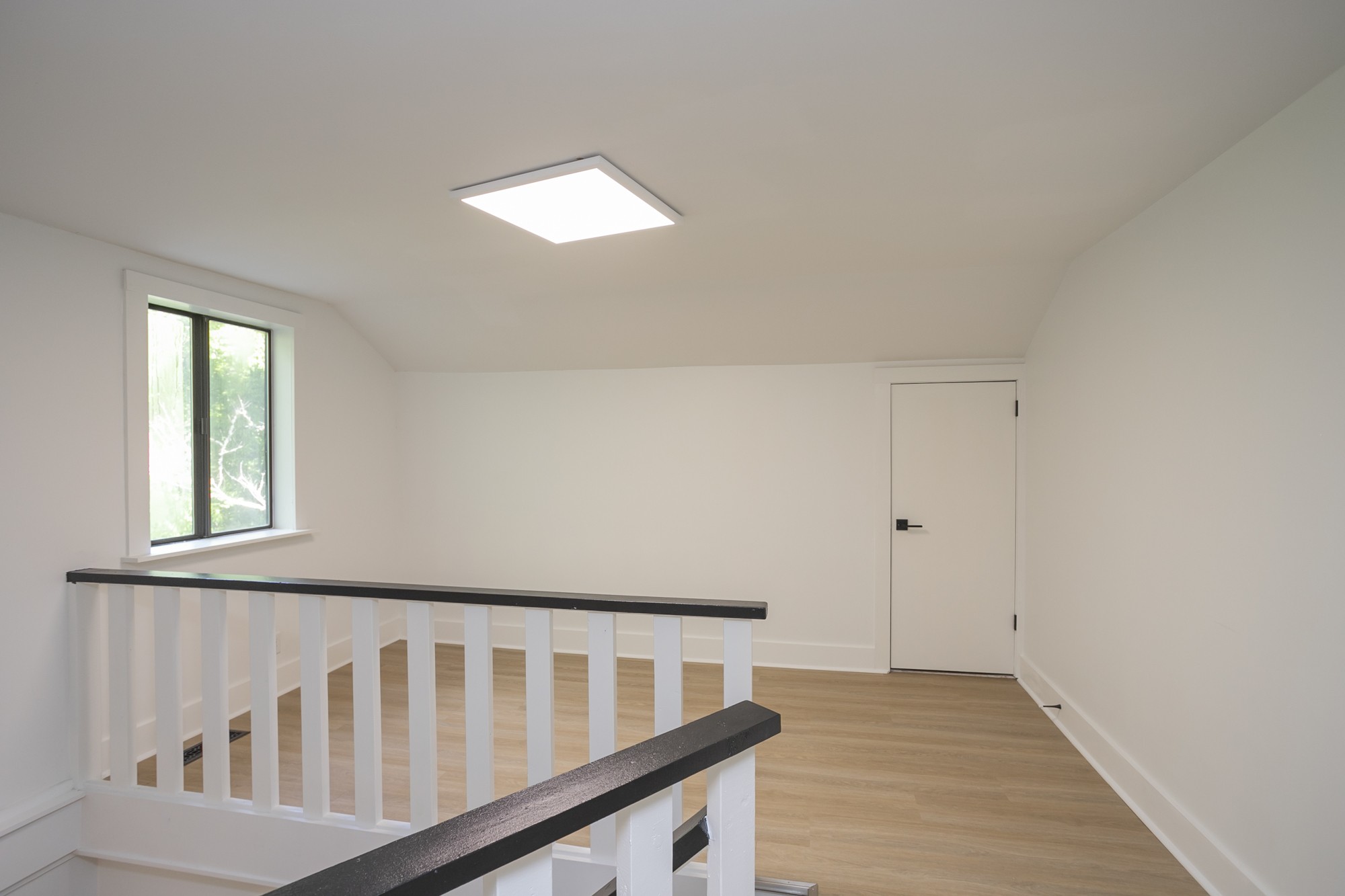 5860 Cane Ridge Road Antioch, TN 37013 - Photo 29 of 46 wooden floor in a hall with a window