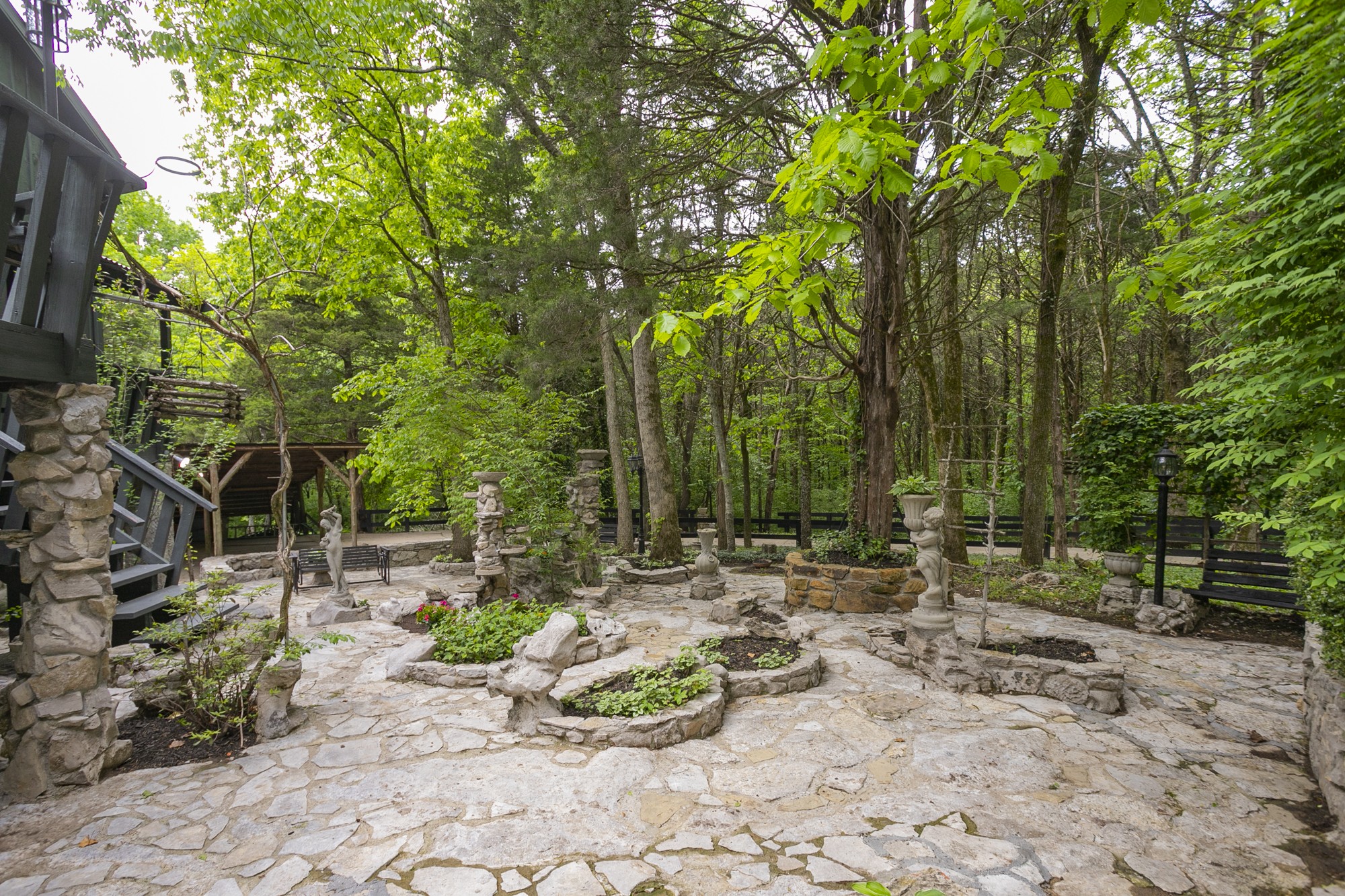 5860 Cane Ridge Road Antioch, TN 37013 - Photo 42 of 46 a backyard of a house with table and chairs