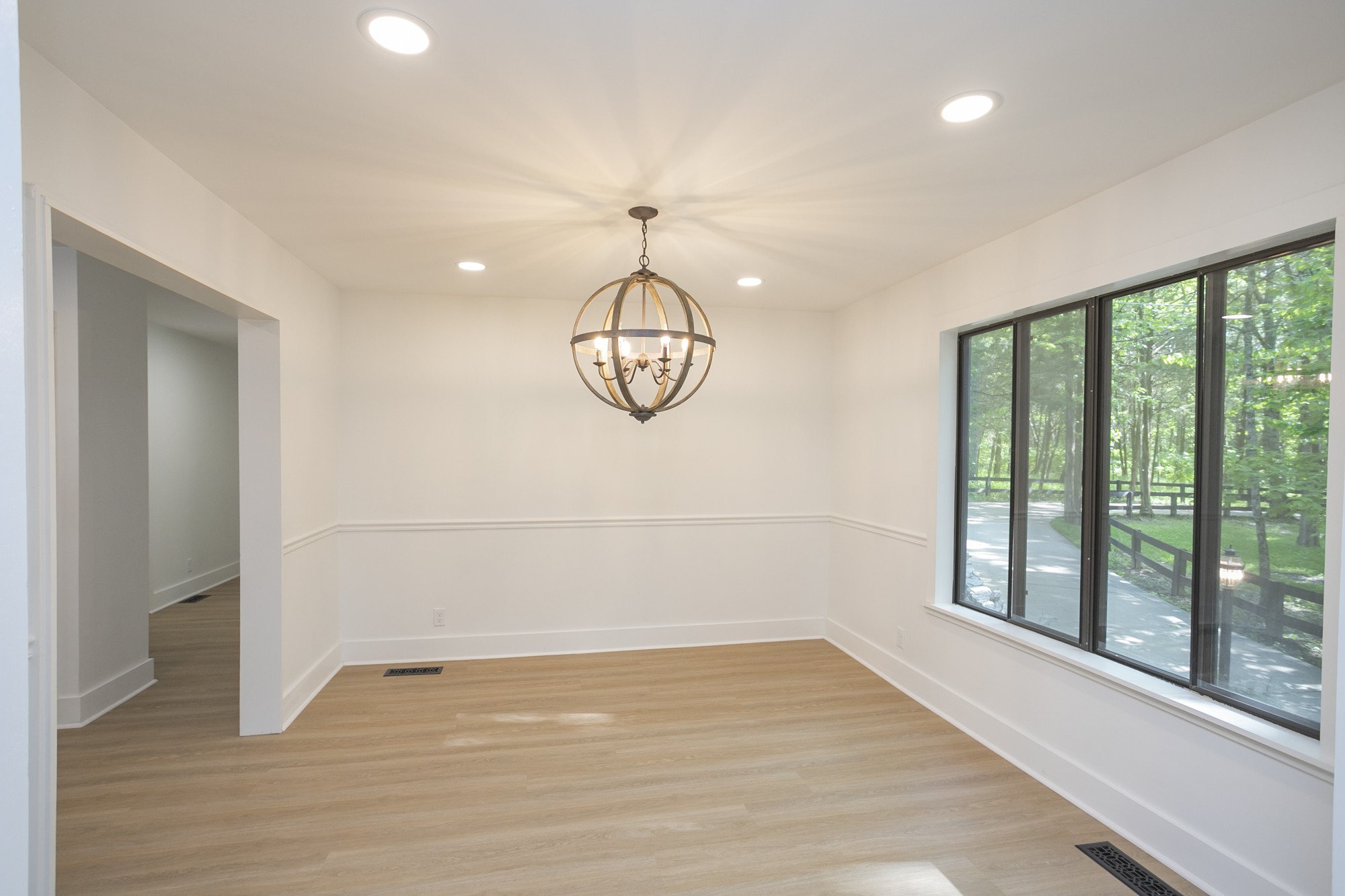 5860 Cane Ridge Road Antioch, TN 37013 - Photo 9 of 46 a view of room with hardwood floor and window