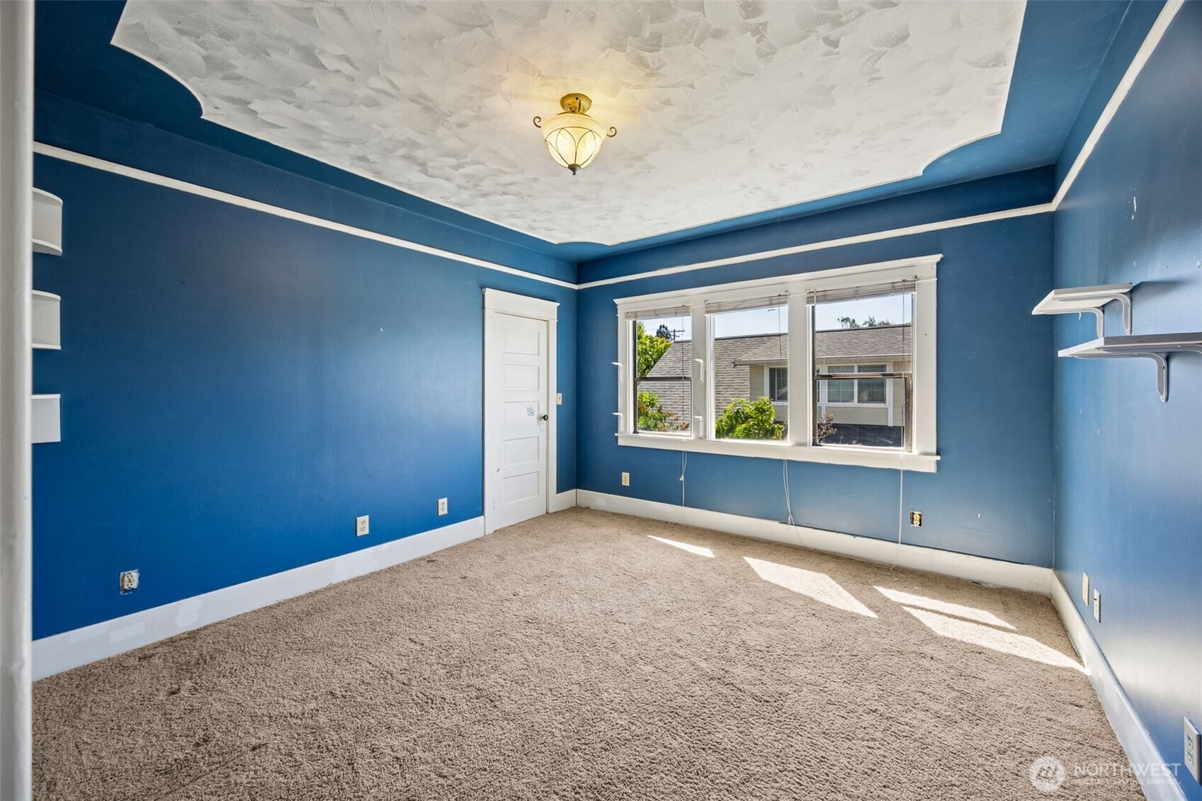 668 Northwest Folsom Street Chehalis, WA 98532 - Photo 17 of 34 a view of an empty room with a window