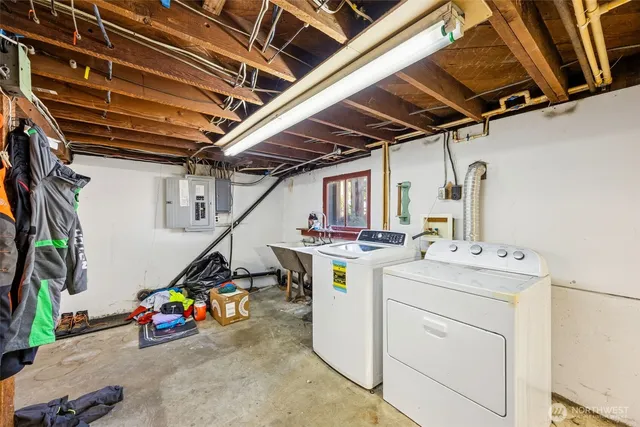 a utility room with dryer and washer