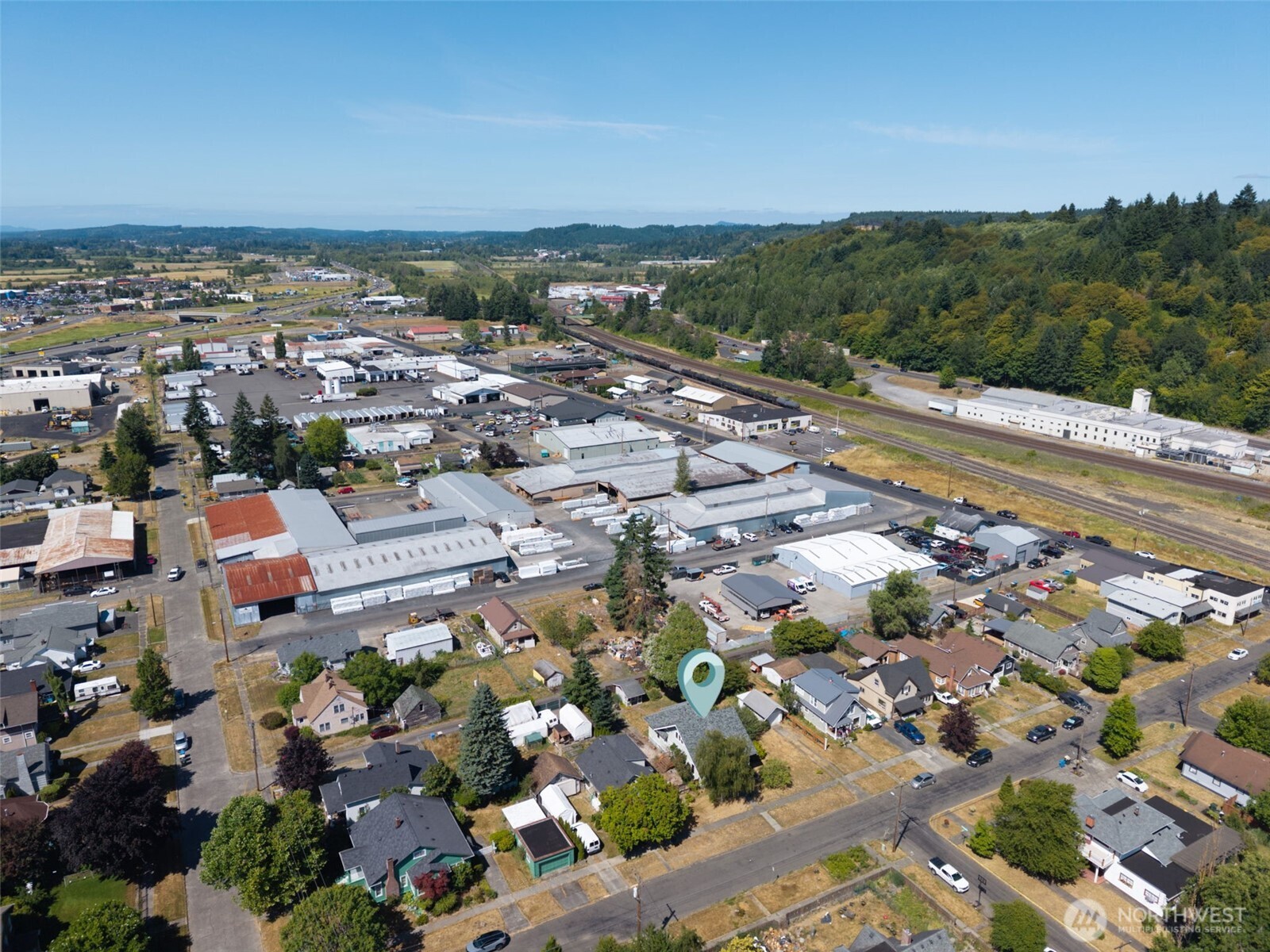 668 Northwest Folsom Street Chehalis, WA 98532 - Photo 27 of 34 an aerial view of residential houses with outdoor space